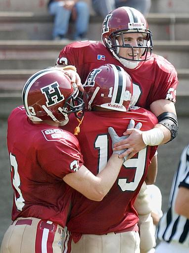 Nick Palazzo scoring a touchdown for Harvard