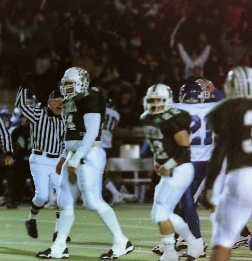 Nick Palazzo celebrating a Mayfield touchdown, 1998